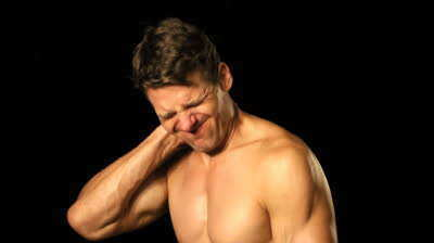 stock-footage-athletic-shirtless-caucasian-man-suffers-with-neck-pain r